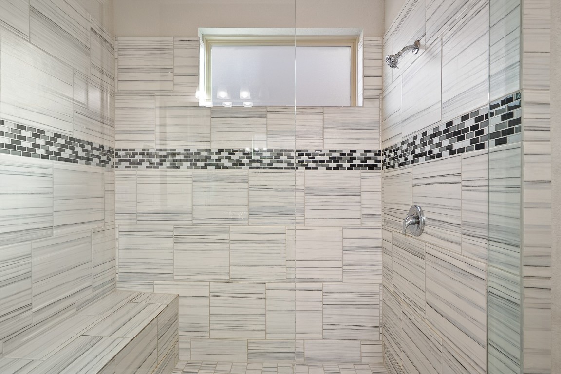 2909 Zelma Drive Cedar Park, TX 78613 - Photo 21 of 40 Full bathroom featuring a tile shower