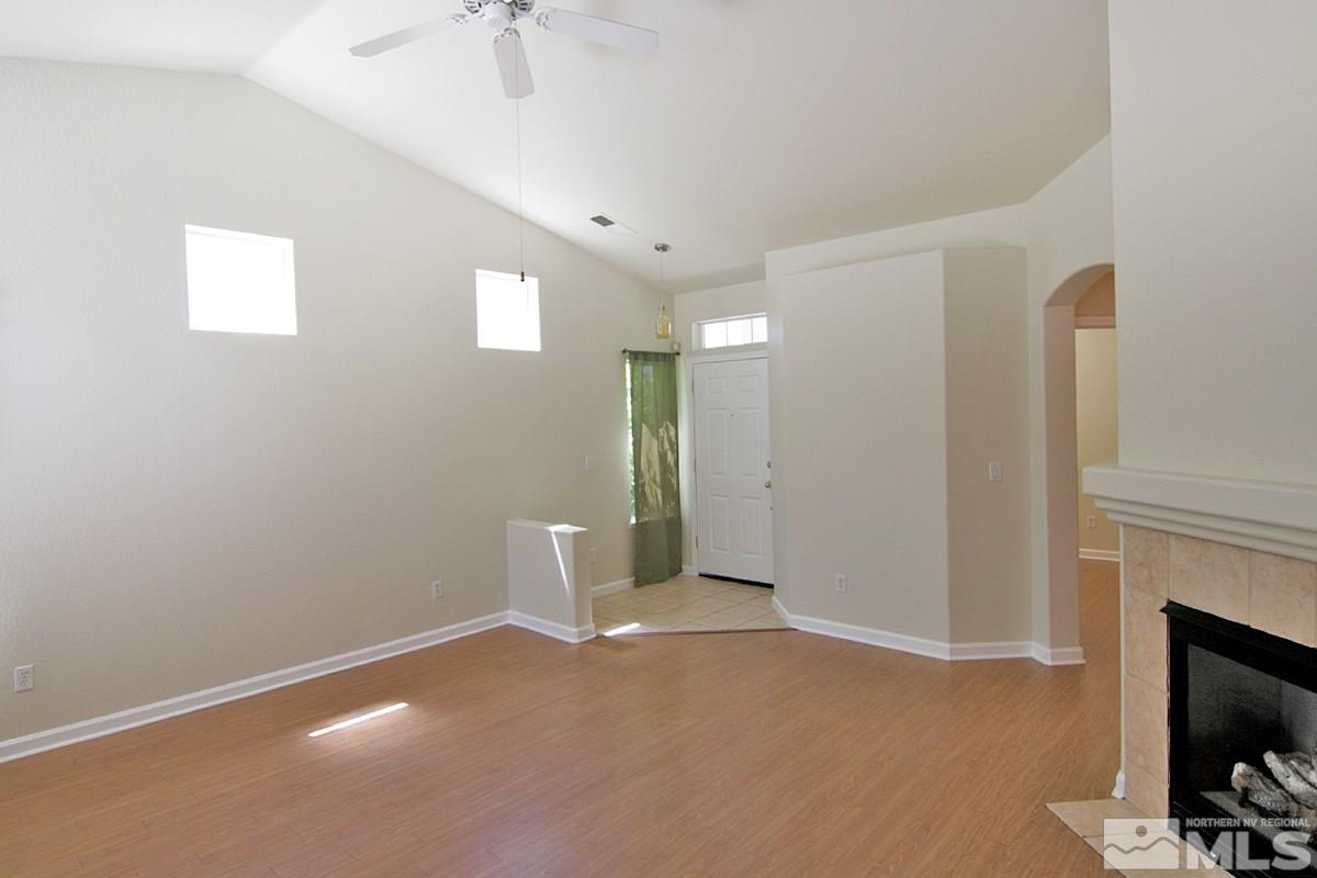 1880 Jamboree Drive Reno, NV 89521 - Photo 11 of 26 a view of an empty room with a fireplace