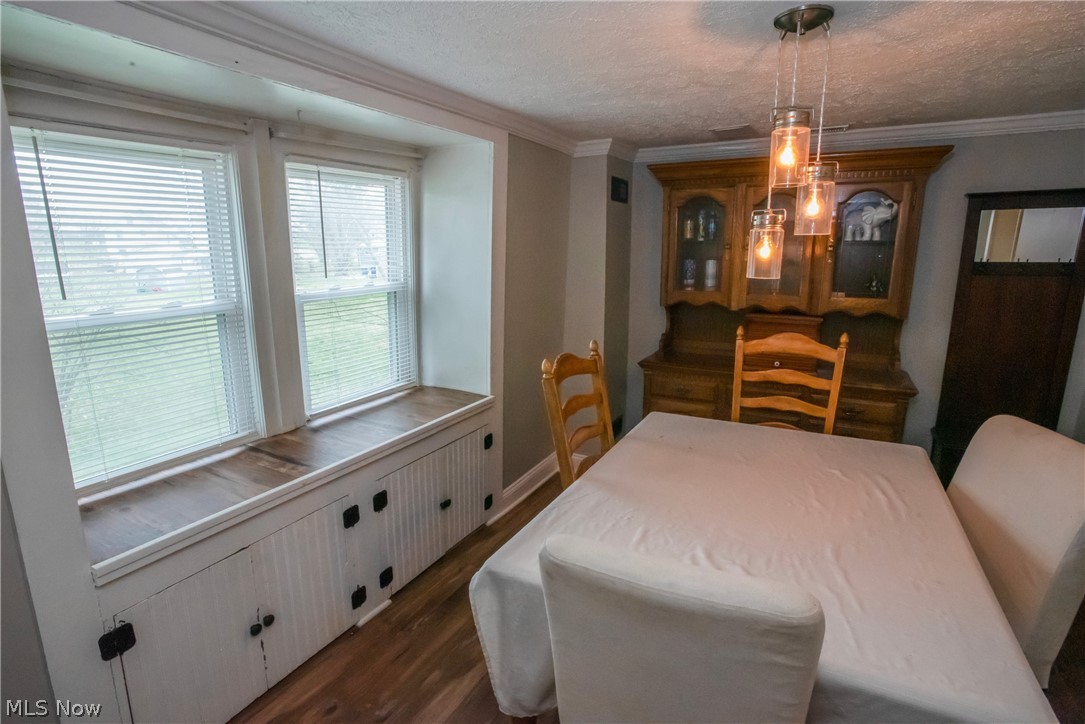 6457 Red Brush Road Ravenna, OH 44266 - Photo 8 of 24 Formal dining room with built-in storage under the windows