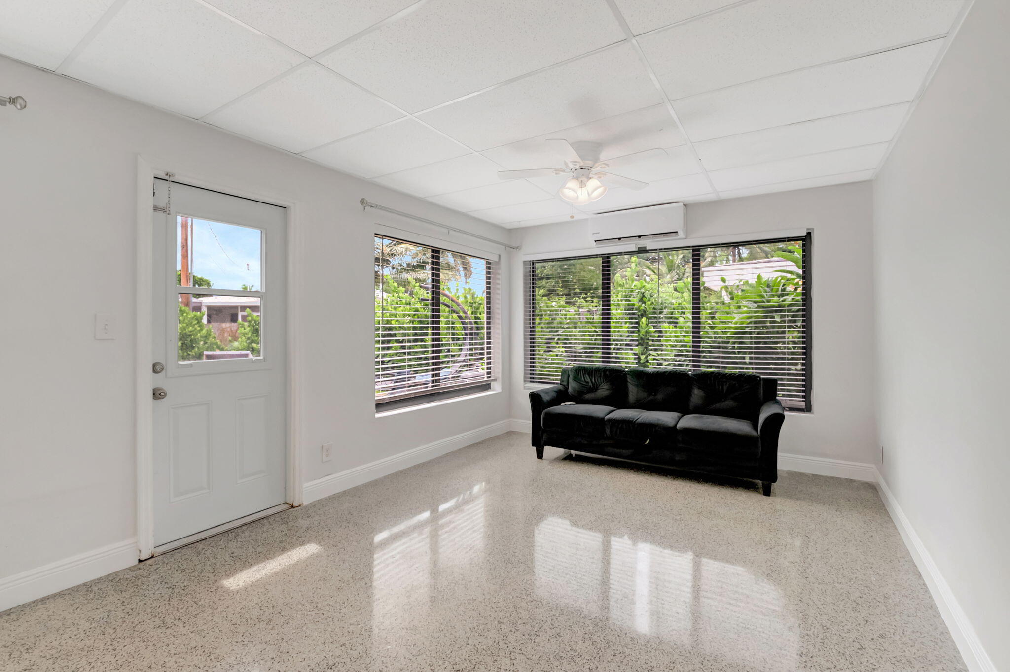 3550 Northeast 4th Avenue Boca Raton, FL 33431 - Photo 20 of 26 a living room with furniture and a large window