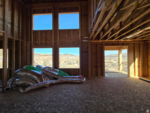 324 North Rhyolite Drive, Unit 87 Hurricane, UT 84737 - Photo 4 of 33 Misc room featuring a high ceiling