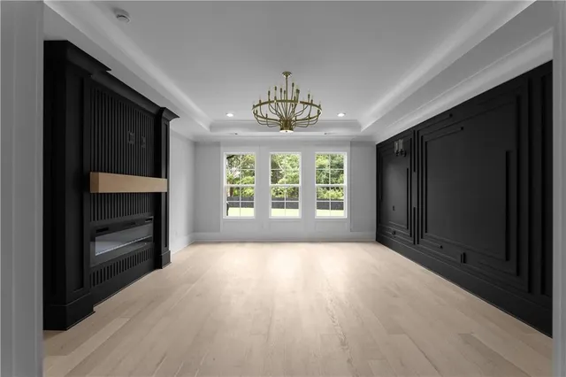 a bathroom with a bathtub and window