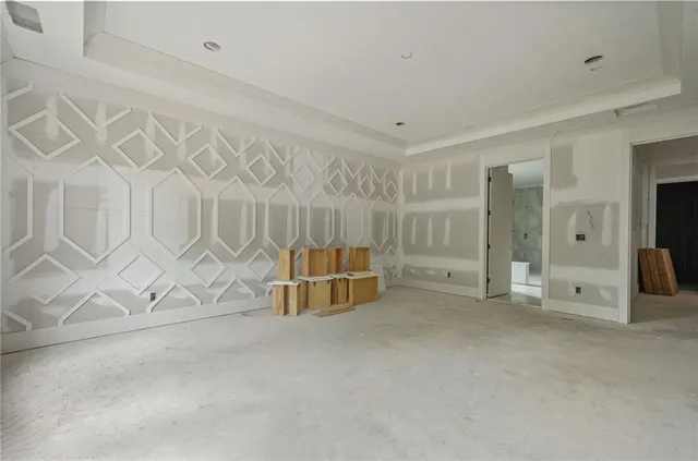 a spacious bathroom with a tub shower and sink