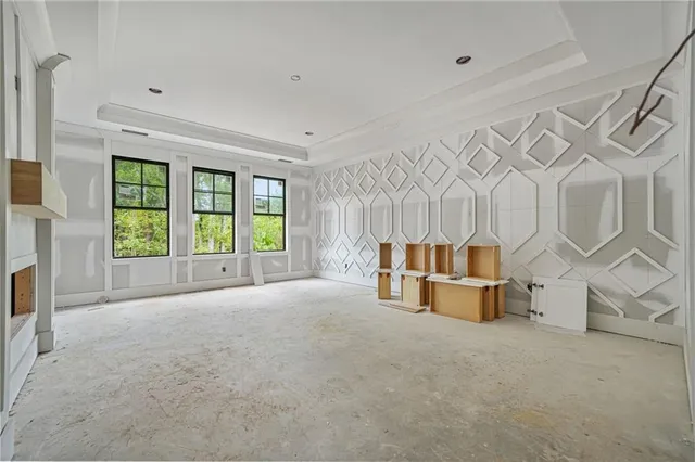 a view of an empty room with empty shelves