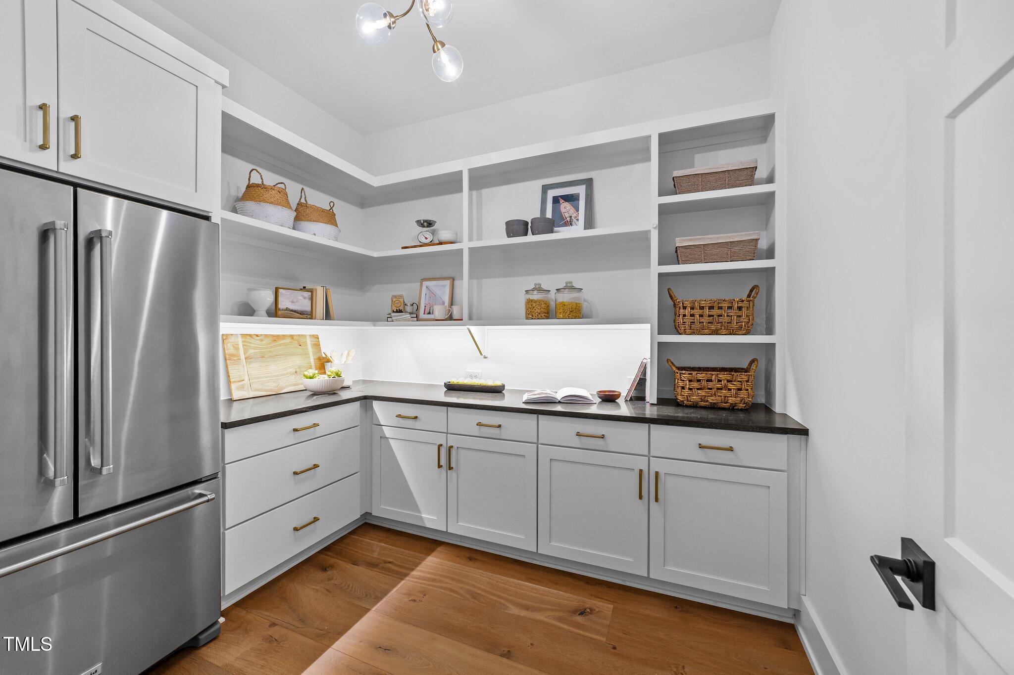 15517 Possum Track Road Raleigh, NC 27614 - Photo 14 of 66 a kitchen with stainless steel appliances granite countertop a refrigerator and a sink