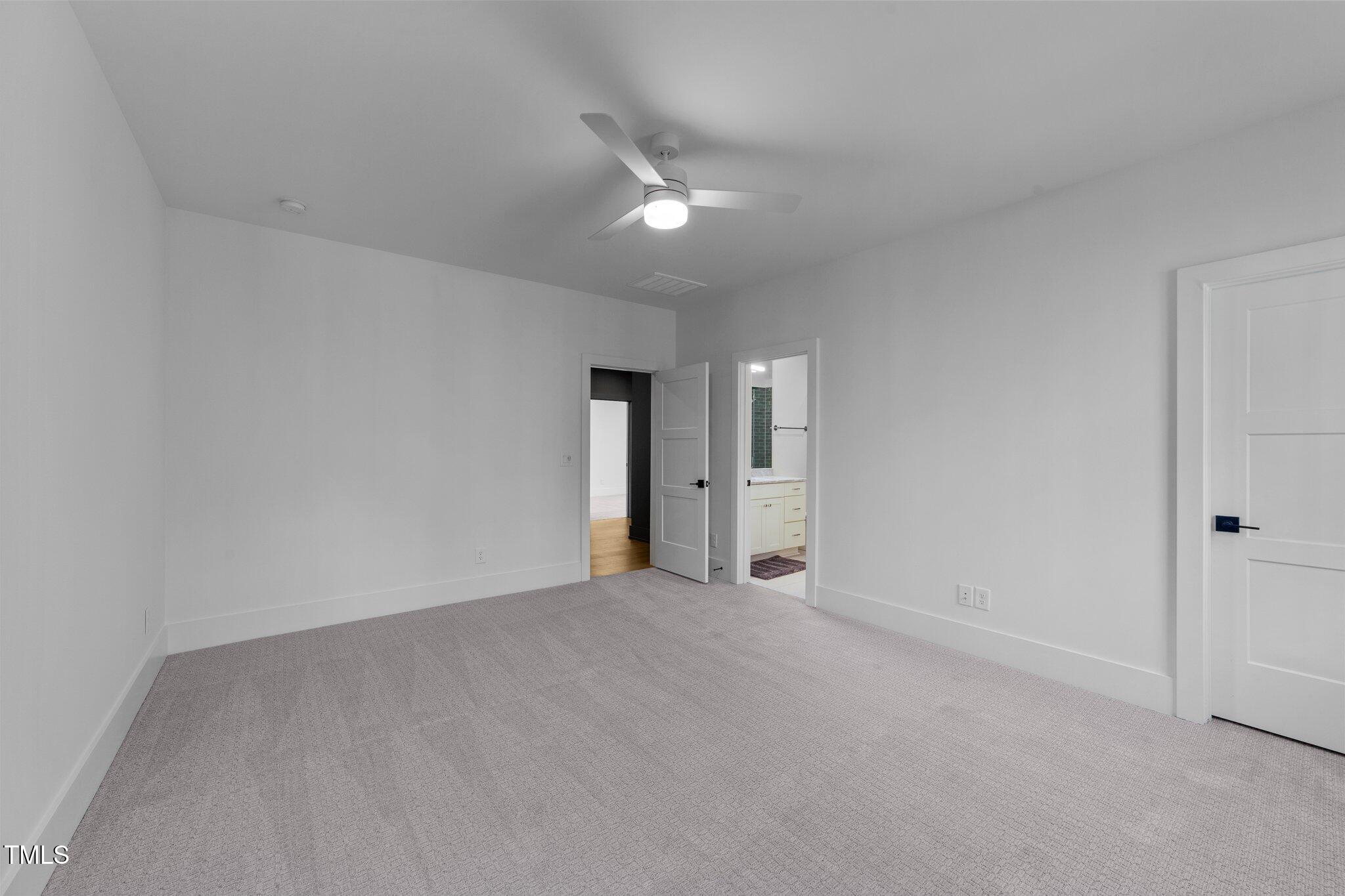 15517 Possum Track Road Raleigh, NC 27614 - Photo 37 of 66 a view of an empty room and a window