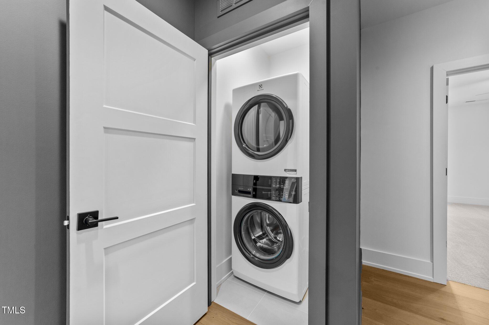 15517 Possum Track Road Raleigh, NC 27614 - Photo 39 of 66 a utility room with dryer and washer
