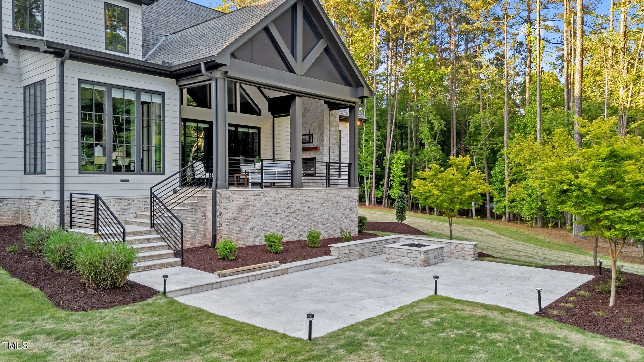 15517 Possum Track Road Raleigh, NC 27614 - Photo 54 of 66 a view of a house with backyard and sitting area