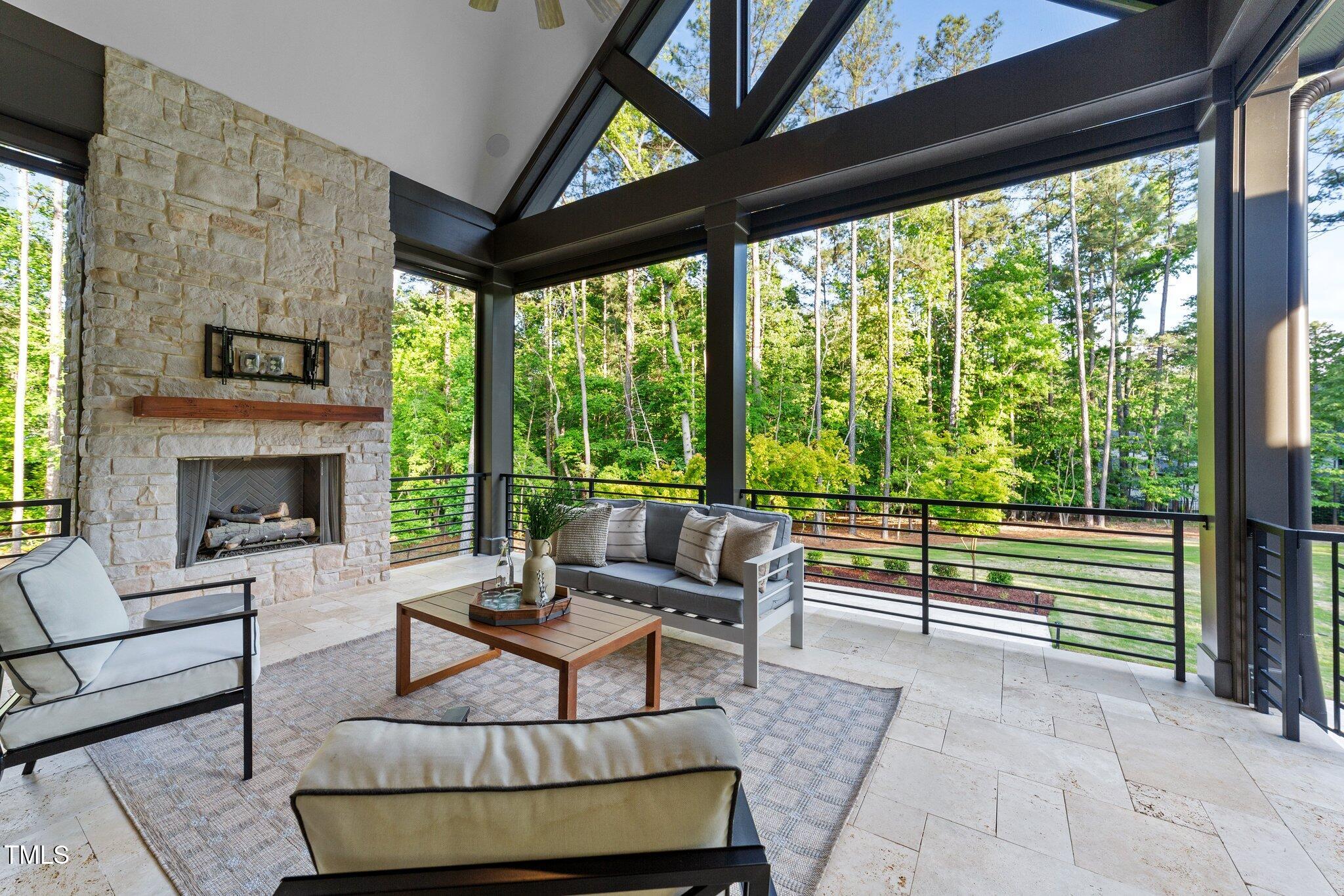 15517 Possum Track Road Raleigh, NC 27614 - Photo 5 of 66 a living room with furniture and a fireplace