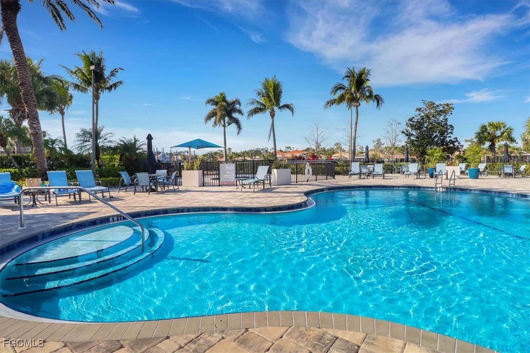 19674 Villa Rosa Loop Estero, FL 33967 - Photo 21 of 33 a view of swimming pool with outdoor seating