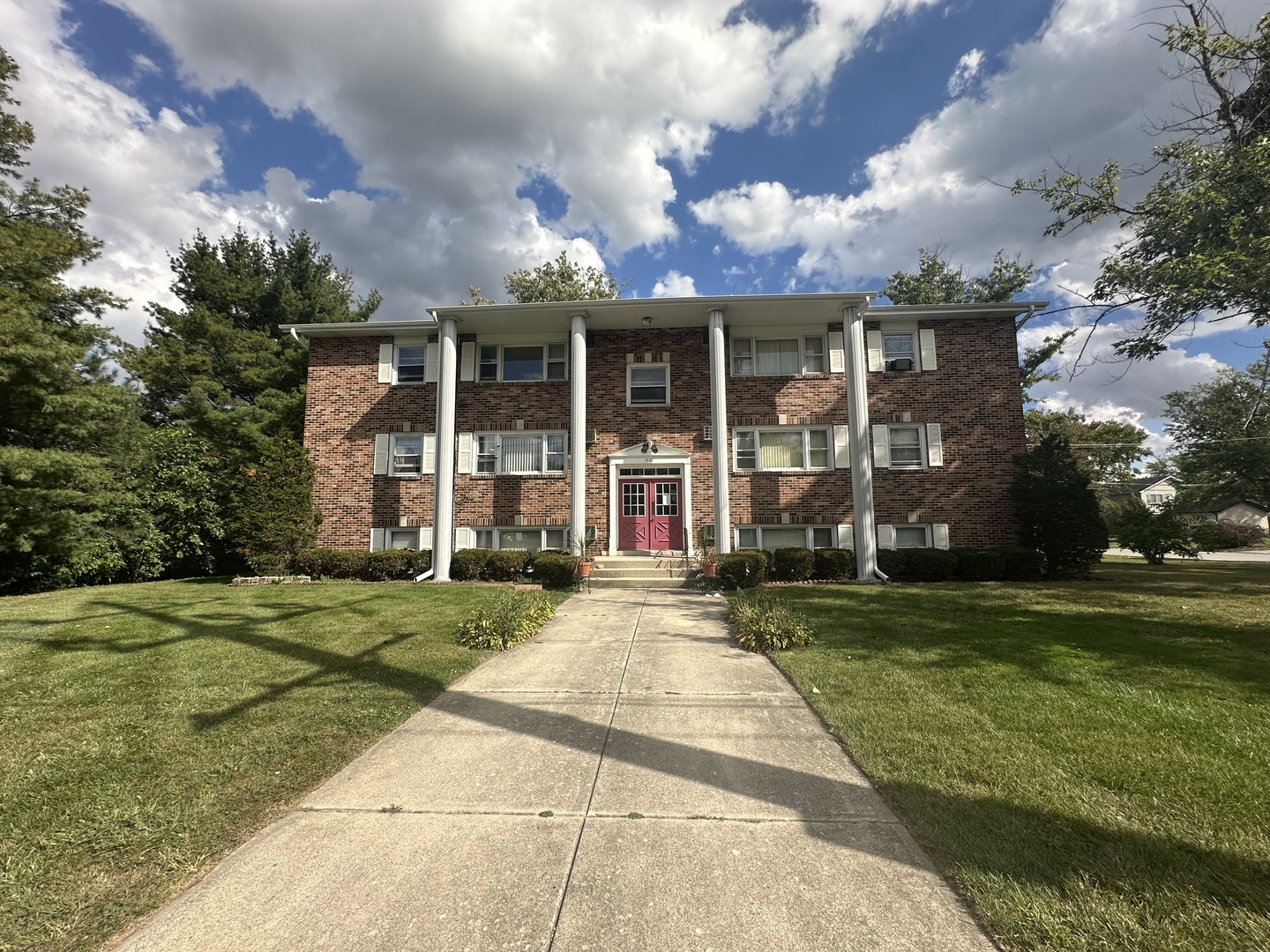 1235 Columbia Street, Unit 5 Crete, IL 60417 - Photo 11 of 13 front view of a house with a yard