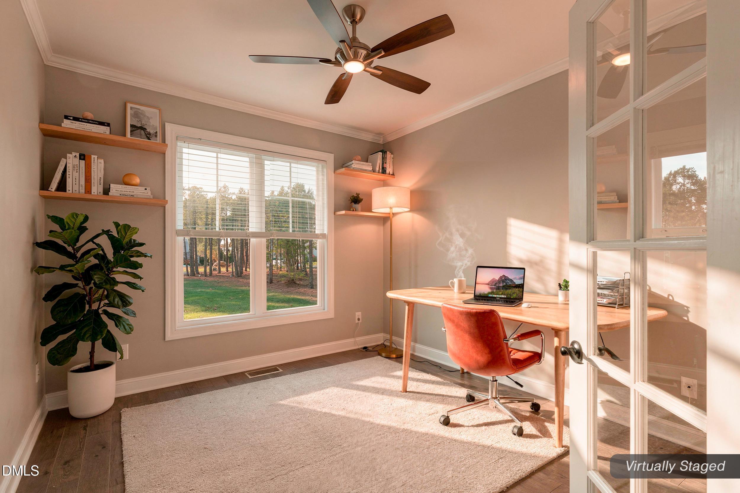 231 High Ridge Lane Pittsboro, NC 27312 - Photo 10 of 47 a view of a workspace with furniture and a potted plant