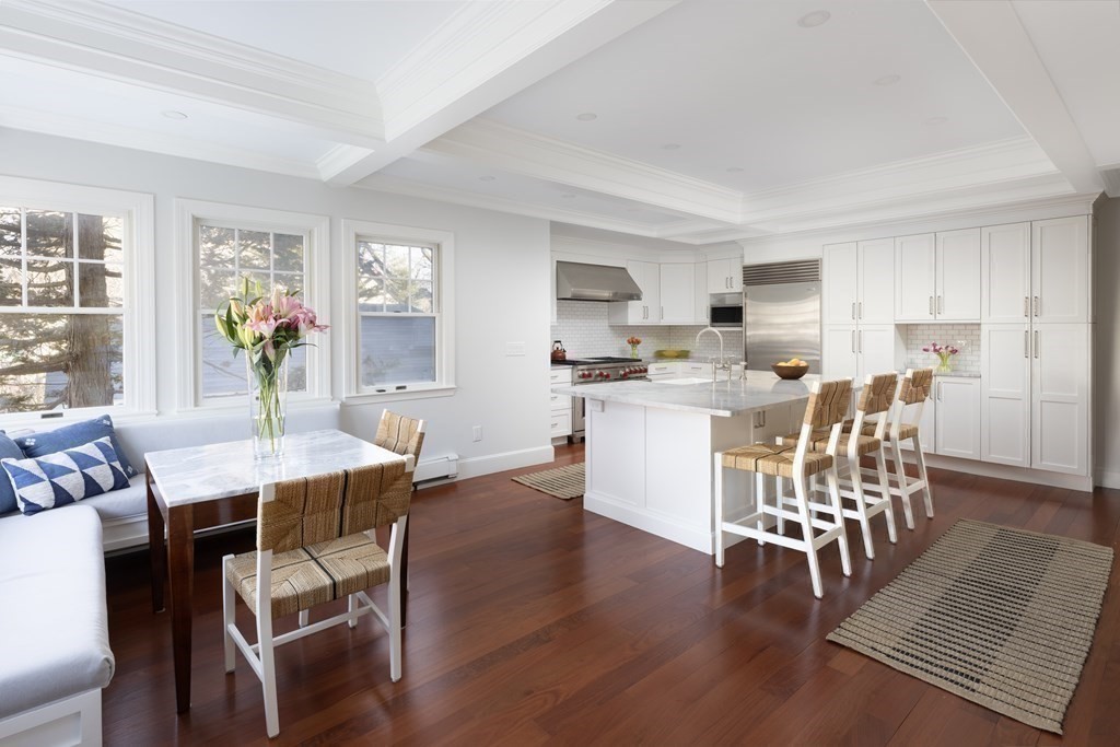 96 Crafts Road Brookline, MA 02467 - Photo 13 of 30 a view of a dining room with furniture and wooden floor