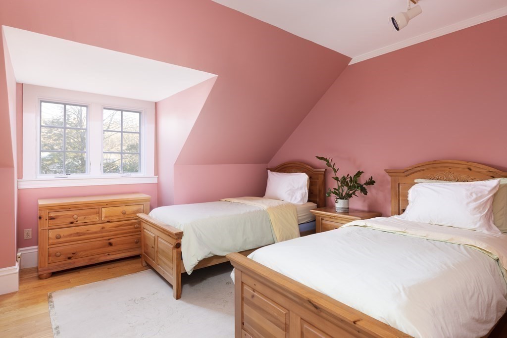 96 Crafts Road Brookline, MA 02467 - Photo 23 of 30 a bedroom with two beds and a large window