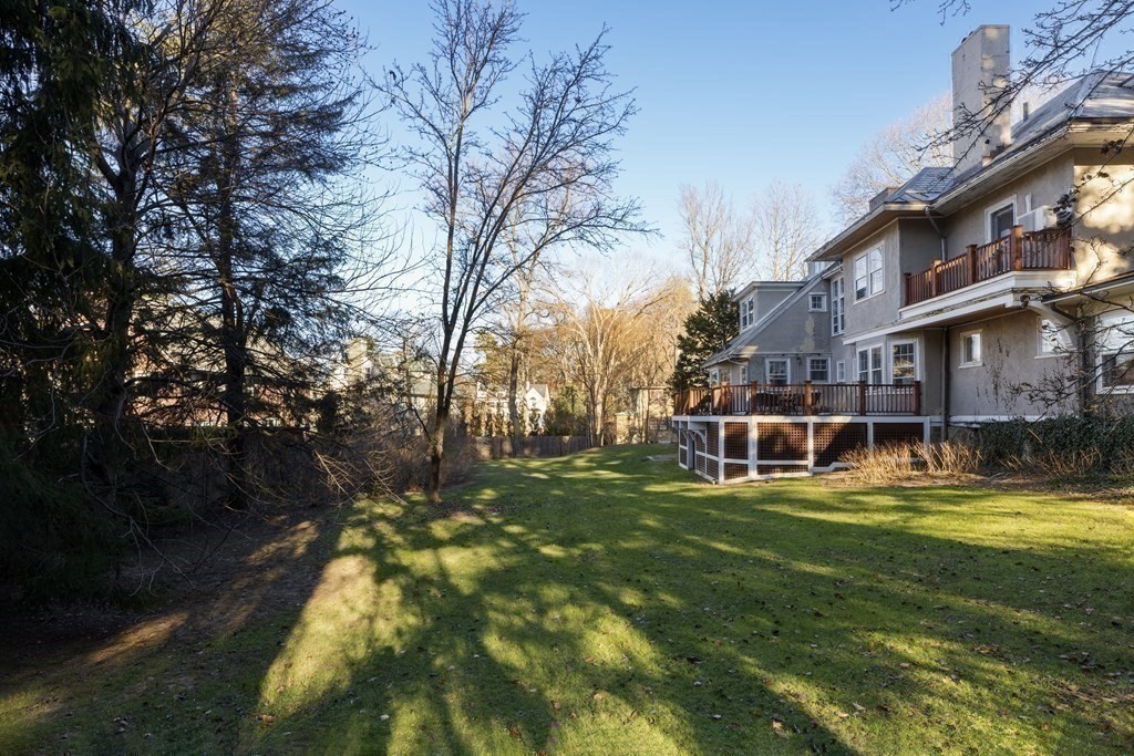 96 Crafts Road Brookline, MA 02467 - Photo 26 of 30 a view of a house with swimming pool and sitting area