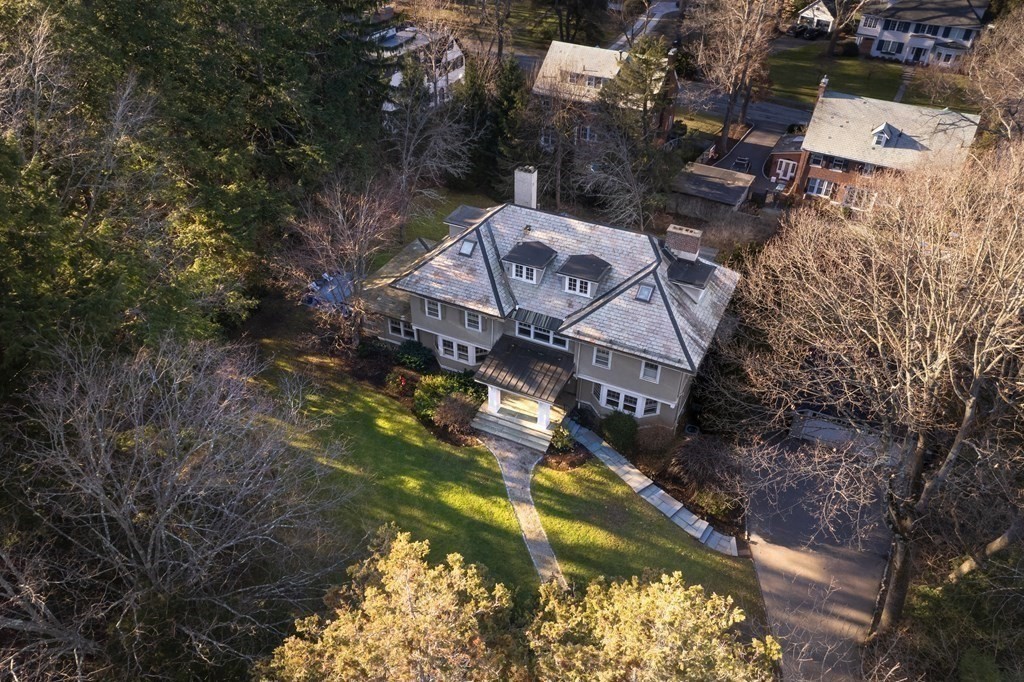 96 Crafts Road Brookline, MA 02467 - Photo 30 of 30 a aerial view of a house with swimming pool and large trees