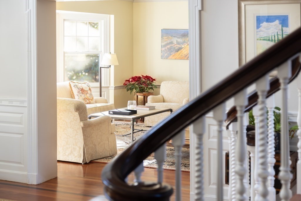 96 Crafts Road Brookline, MA 02467 - Photo 5 of 30 a view of entryway and hall with wooden floor