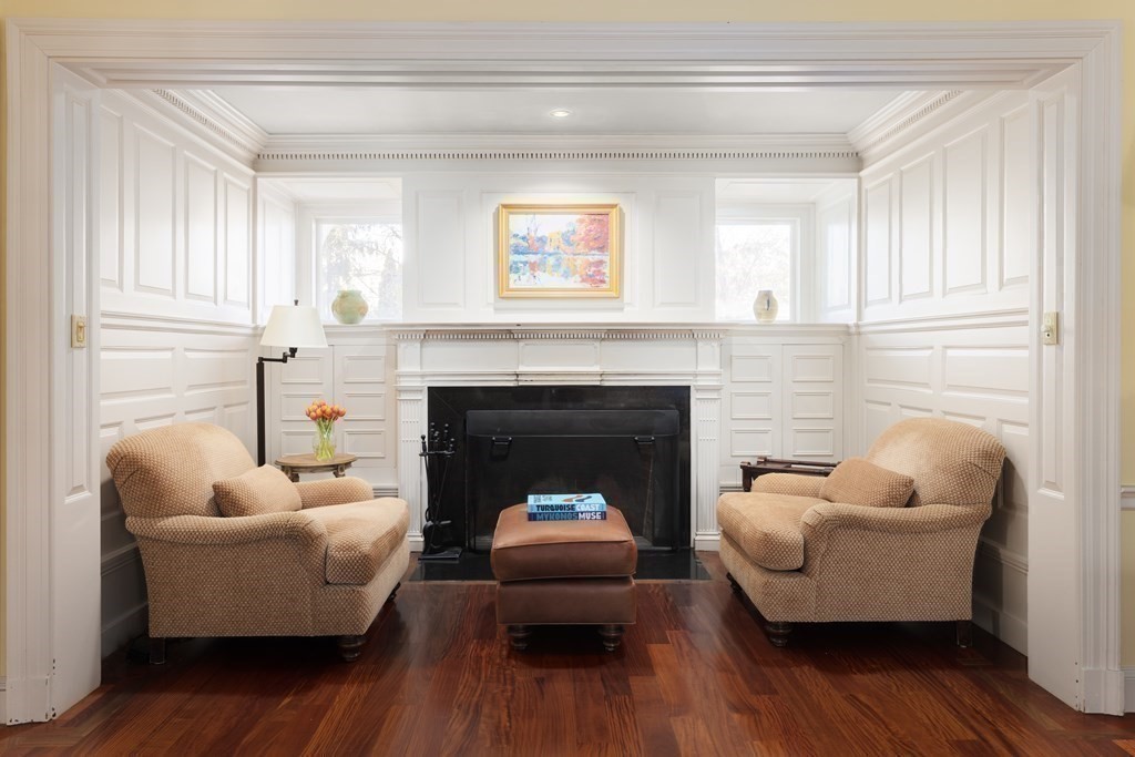 96 Crafts Road Brookline, MA 02467 - Photo 8 of 30 a living room with furniture and a fireplace