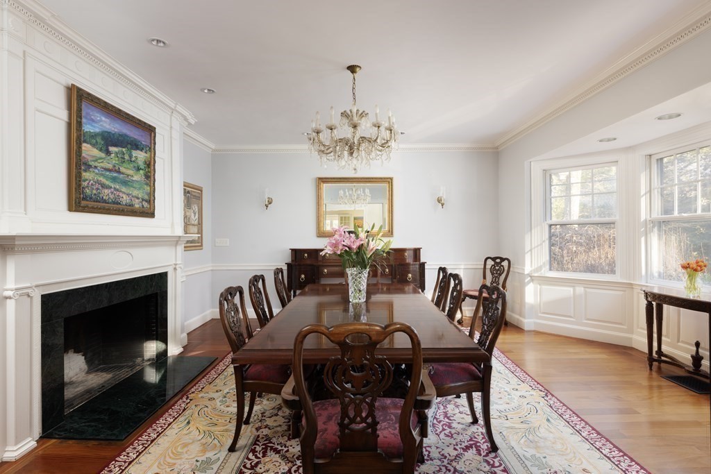 96 Crafts Road Brookline, MA 02467 - Photo 10 of 30 a view of a dining room with furniture window and wooden floor