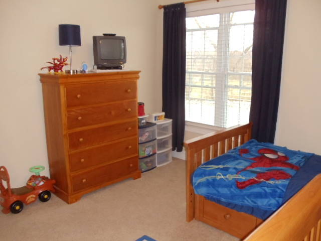1624 Meadows Road Vinton, VA 24179 - Photo 16 of 30 a bedroom with a bed and a window