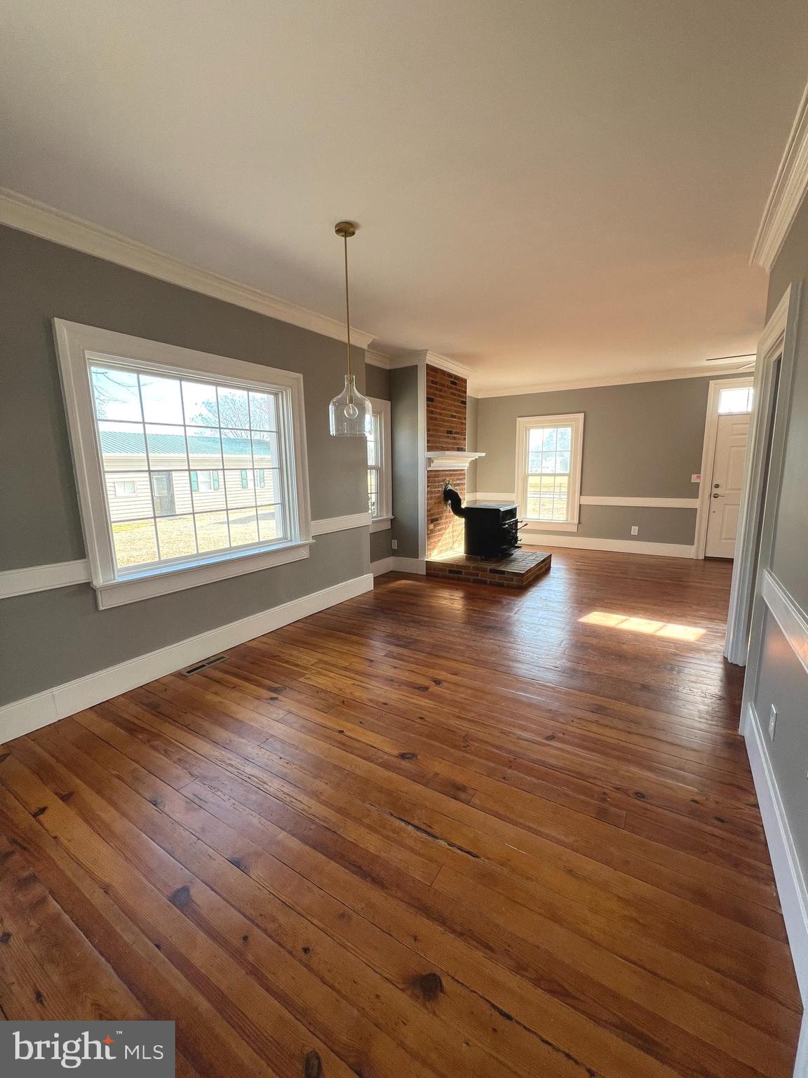 7617 Old Plank Road Fredericksburg, VA 22407 - Photo 19 of 61 a view of empty room with wooden floor and window