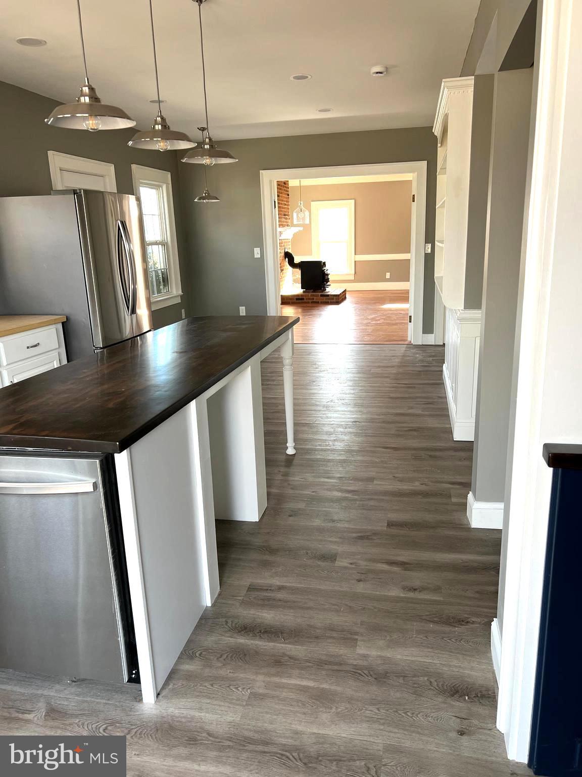 7617 Old Plank Road Fredericksburg, VA 22407 - Photo 3 of 61 a view of a hallway with wooden floor