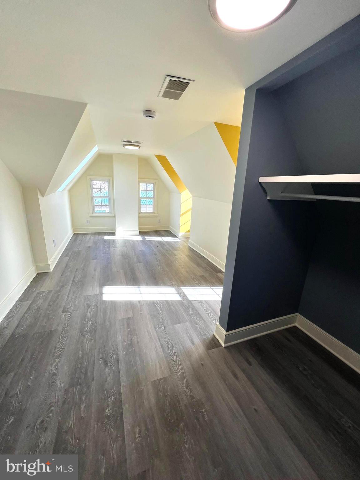 7617 Old Plank Road Fredericksburg, VA 22407 - Photo 37 of 61 a view of an empty room with wooden floor and a window