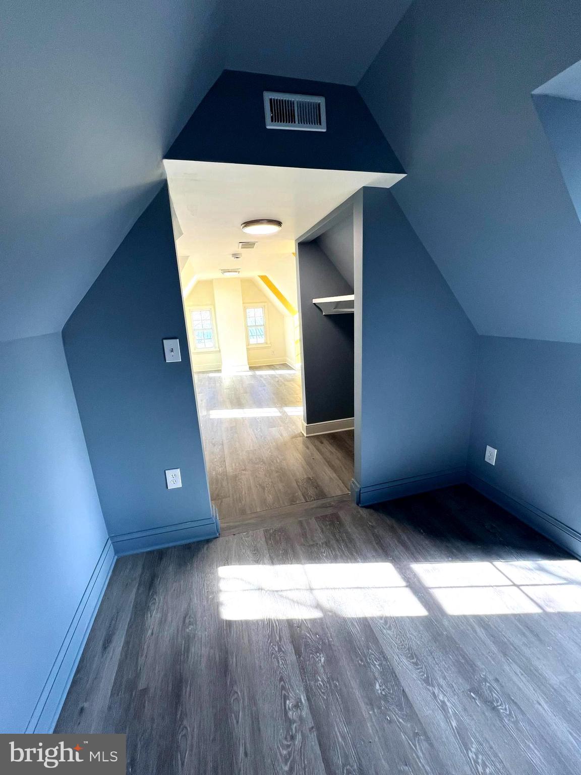 7617 Old Plank Road Fredericksburg, VA 22407 - Photo 40 of 61 a view of a big room with wooden floor and staircase