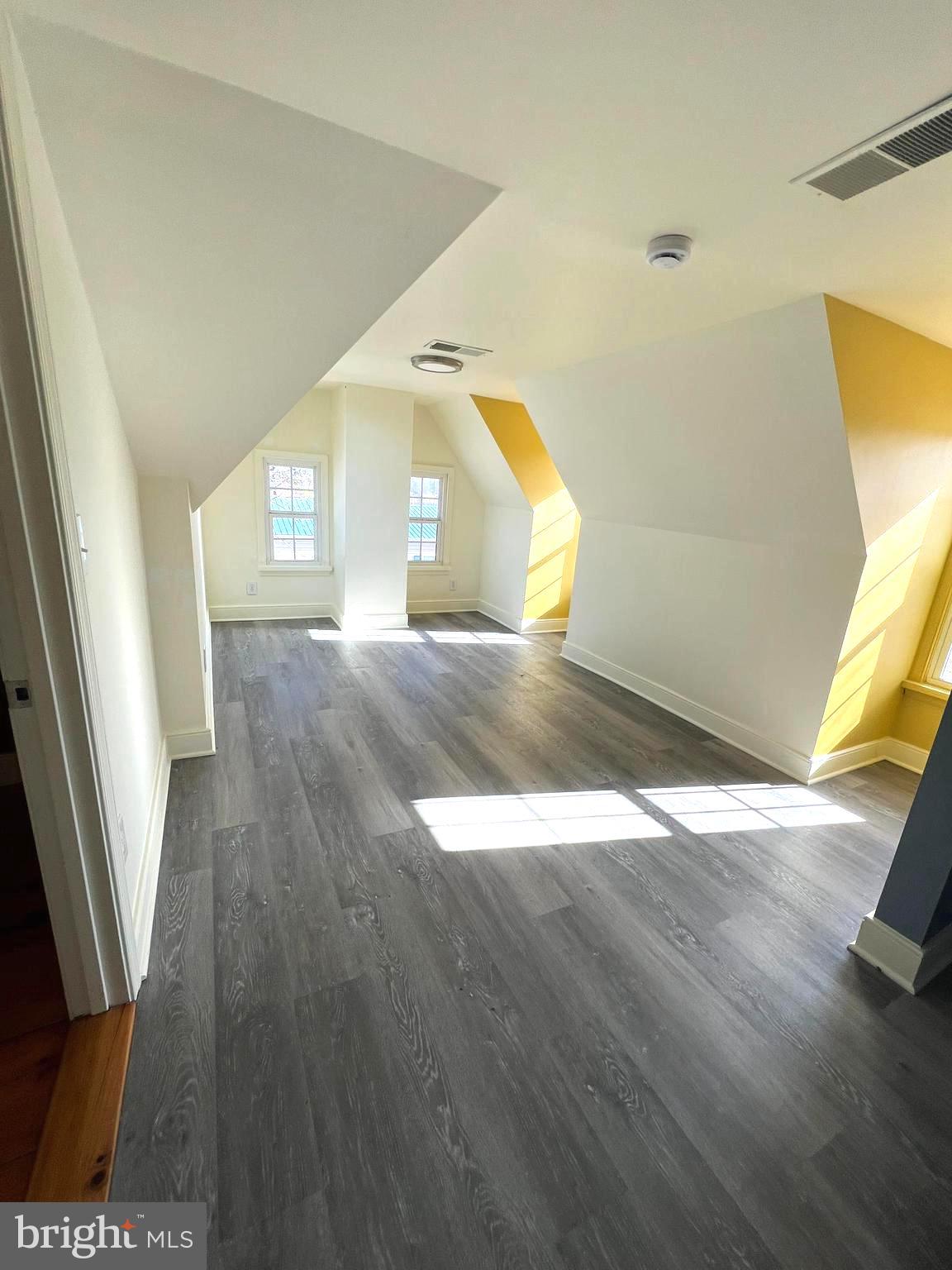 7617 Old Plank Road Fredericksburg, VA 22407 - Photo 41 of 61 a view of a living room with a wooden floor