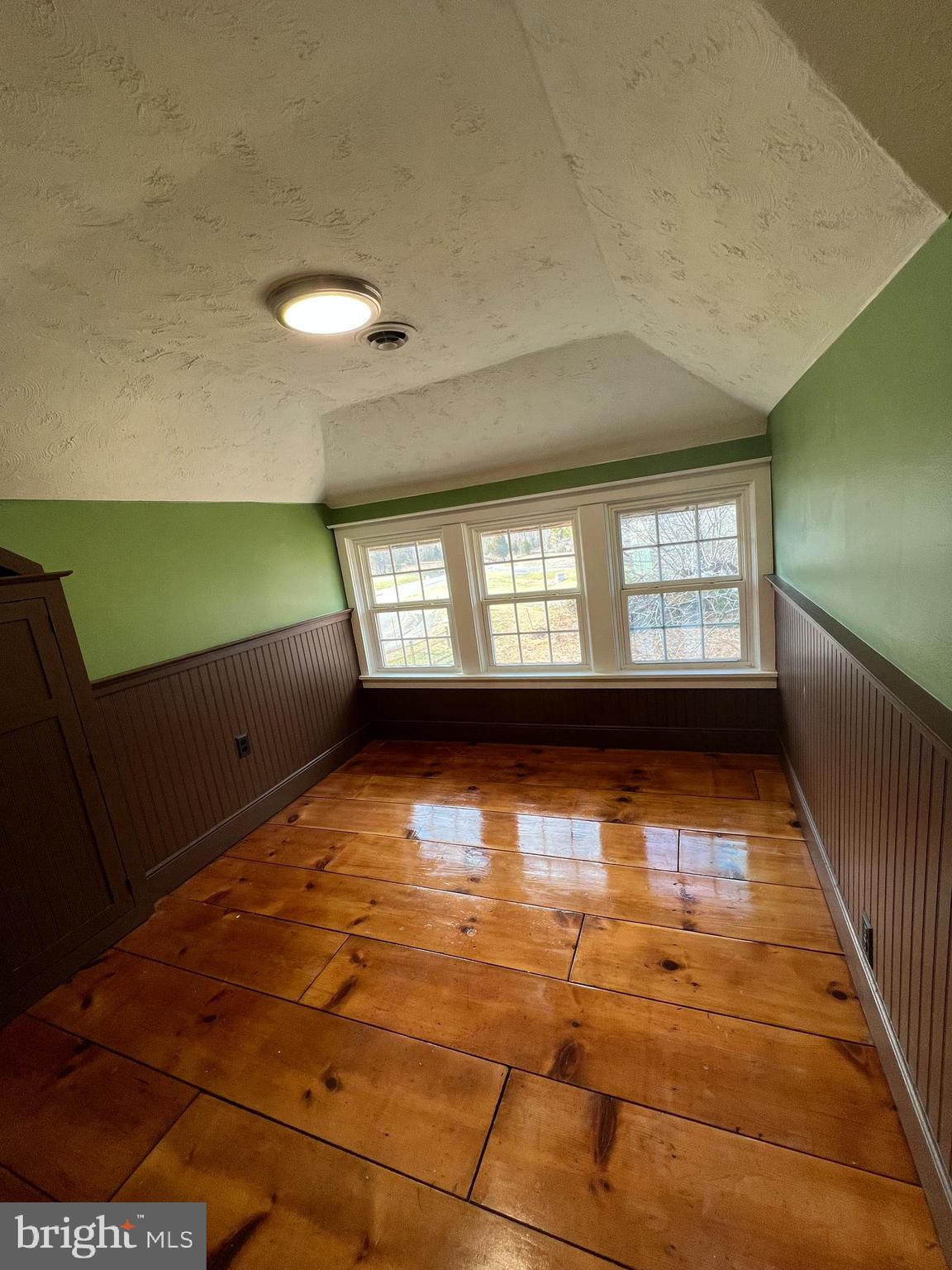 7617 Old Plank Road Fredericksburg, VA 22407 - Photo 43 of 61 a view of empty room with wooden floor and fan