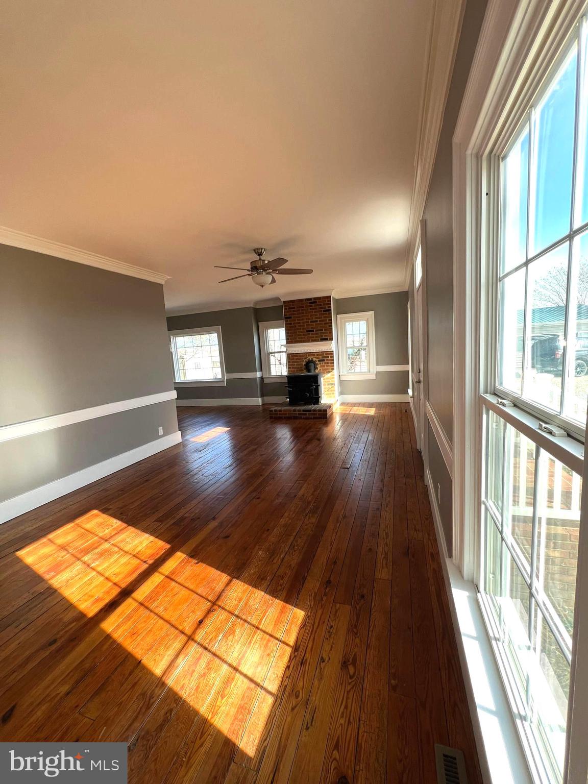 7617 Old Plank Road Fredericksburg, VA 22407 - Photo 48 of 61 wooden floor in an empty room with a window