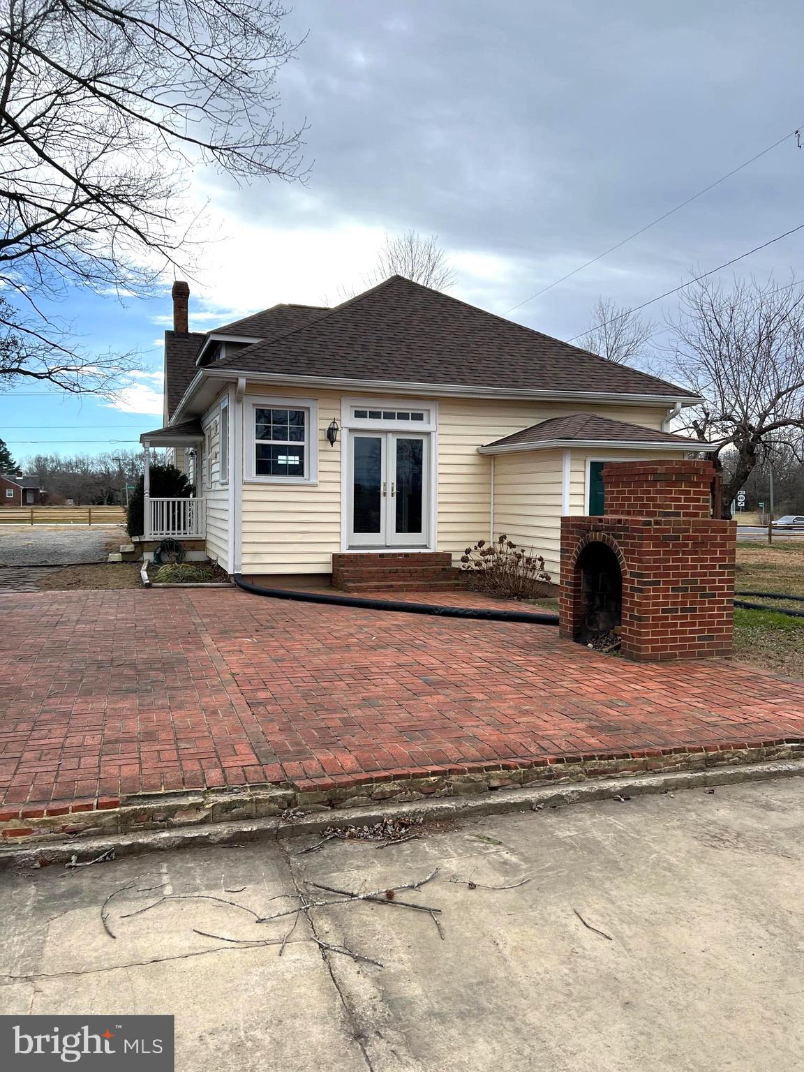 7617 Old Plank Road Fredericksburg, VA 22407 - Photo 58 of 61 a front view of a house with a yard and garage
