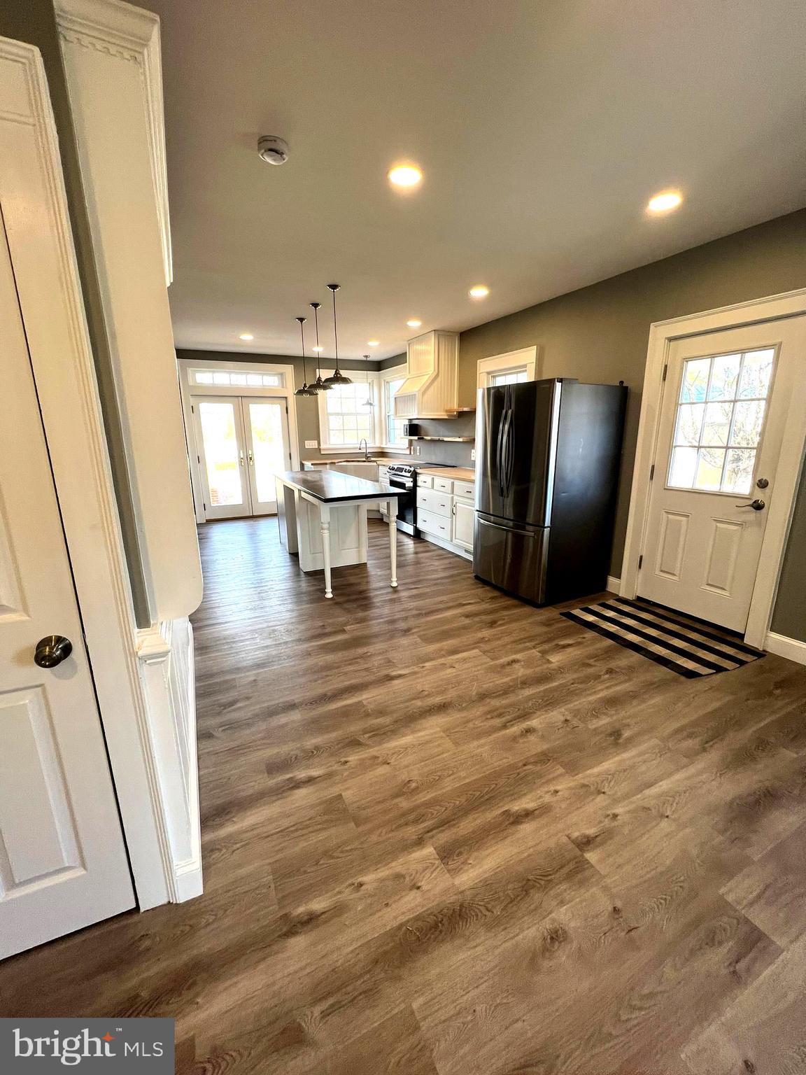 7617 Old Plank Road Fredericksburg, VA 22407 - Photo 6 of 61 a view of kitchen with furniture and wooden floor