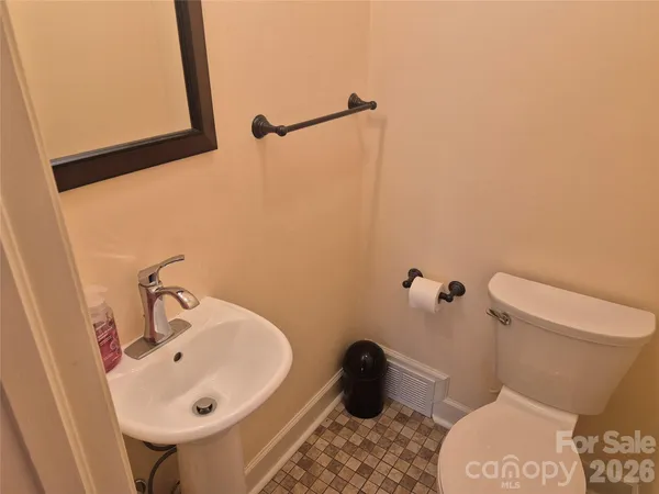 a bathroom with a sink and a toilet