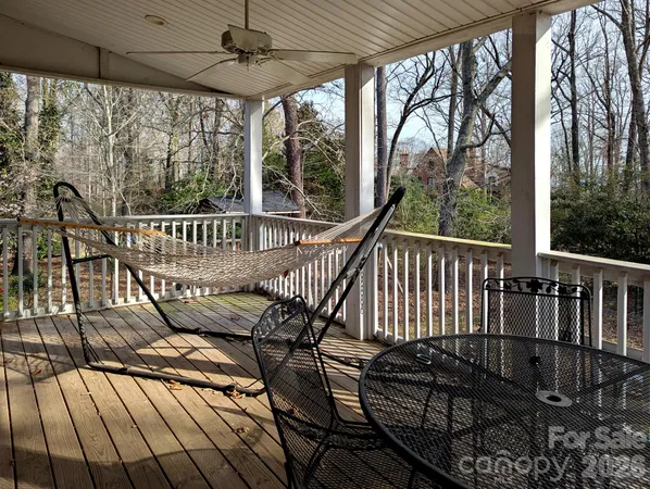a view of balcony with furniture
