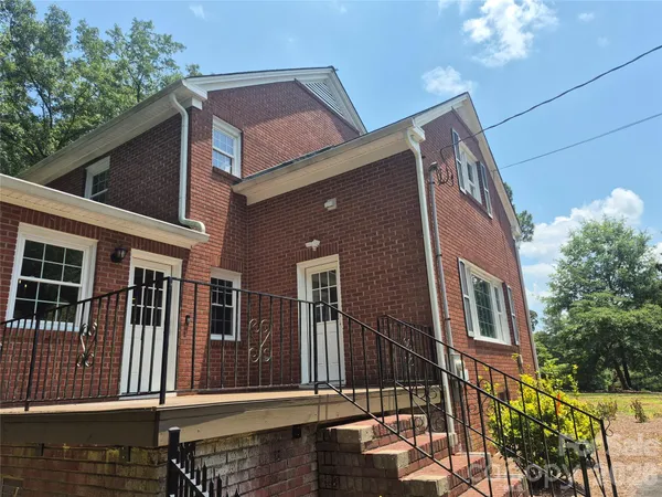 a front view of a house with balcony