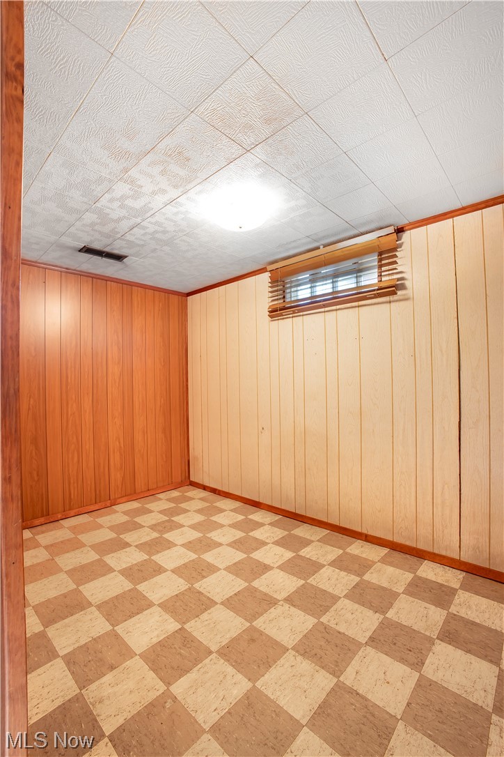 1590 Norledge Road Akron, OH 44305 - Photo 18 of 21 Basement with wood walls
