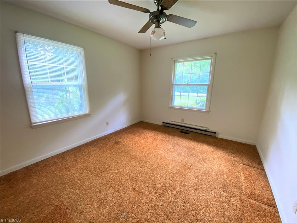 6603 Company Mill Road Climax, NC 27233 - Photo 11 of 24 2nd bedroom at the end of the hall and to the right.