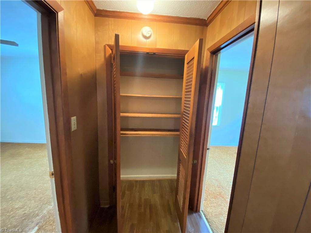 6603 Company Mill Road Climax, NC 27233 - Photo 14 of 24 Here at the end of the hall is the linen closet with built in shelves.