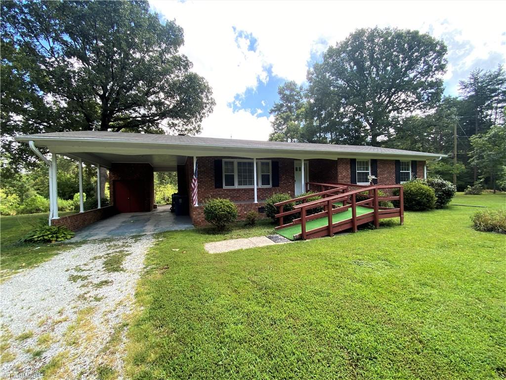 6603 Company Mill Road Climax, NC 27233 - Photo 15 of 24 The front entrance to the house has a handicap ramp for ease of entry. You can also see that there is additional space in the closet at the back of the carport.