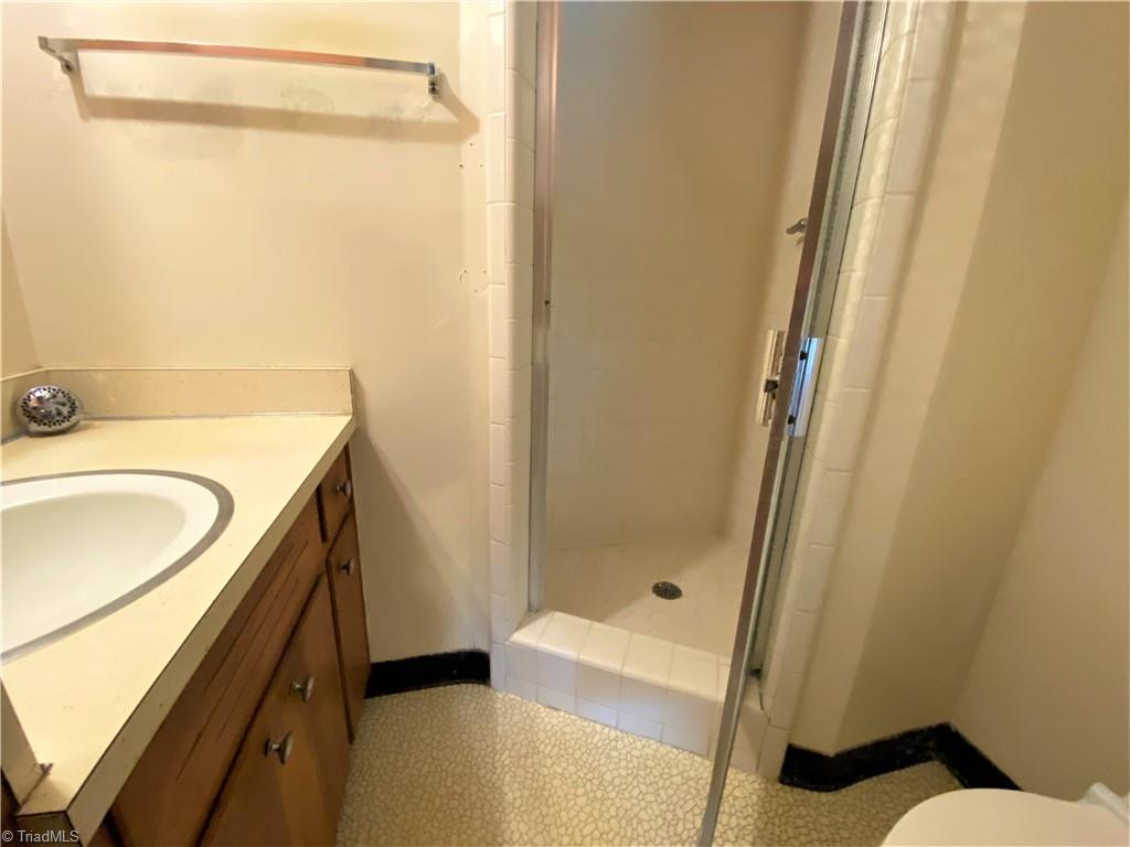 6603 Company Mill Road Climax, NC 27233 - Photo 8 of 24 Primary full bath with a tile shower.