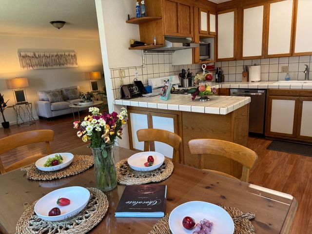 a kitchen with a sink and a window