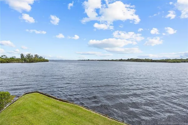 a view of a garden with houses