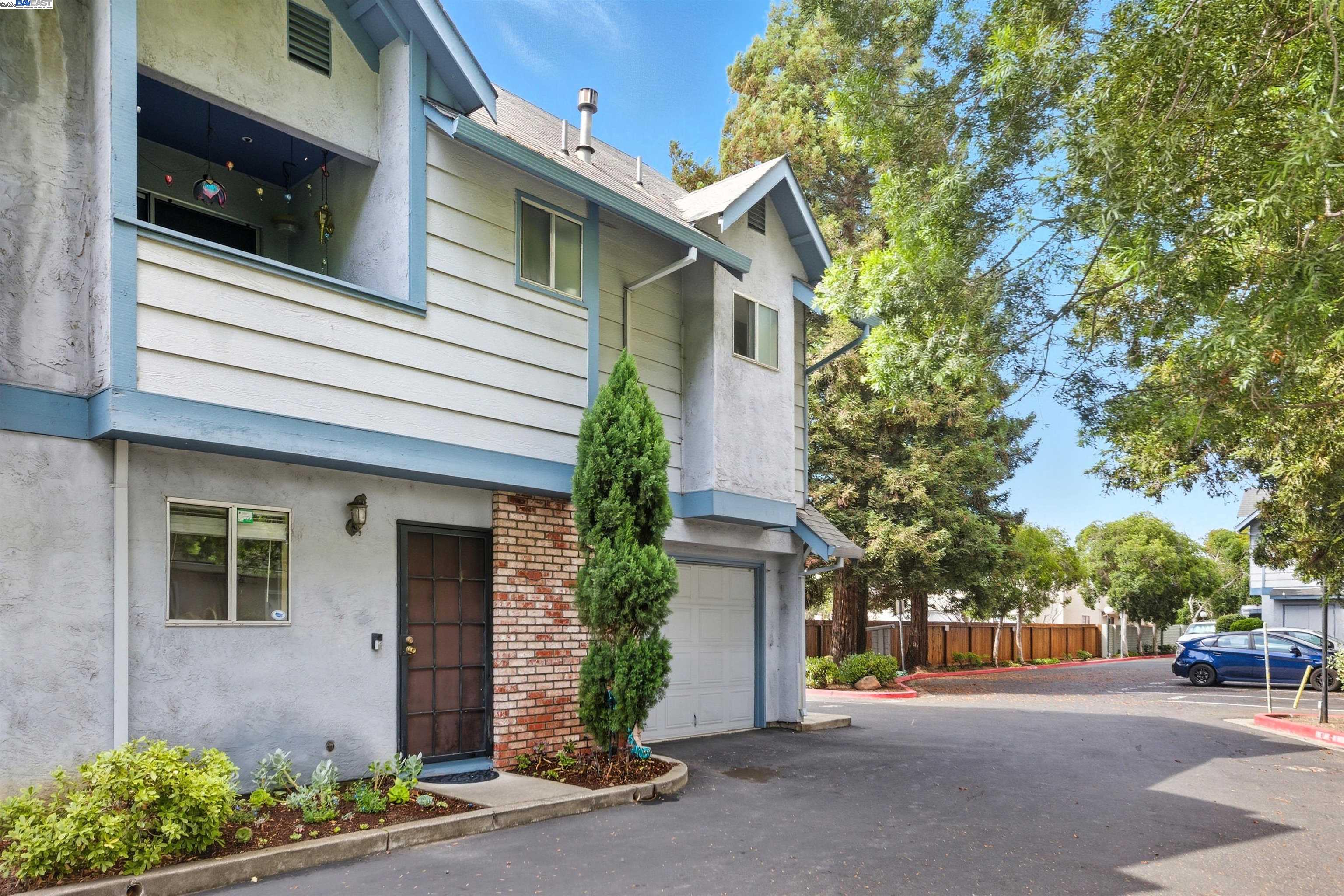 a view of a house with a street