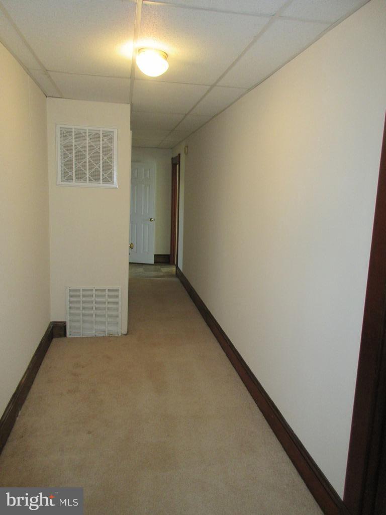 24790 Colton Point Road Clements, MD 20624 - Photo 13 of 16 an empty room with windows