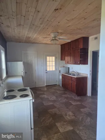 a room with furniture and window