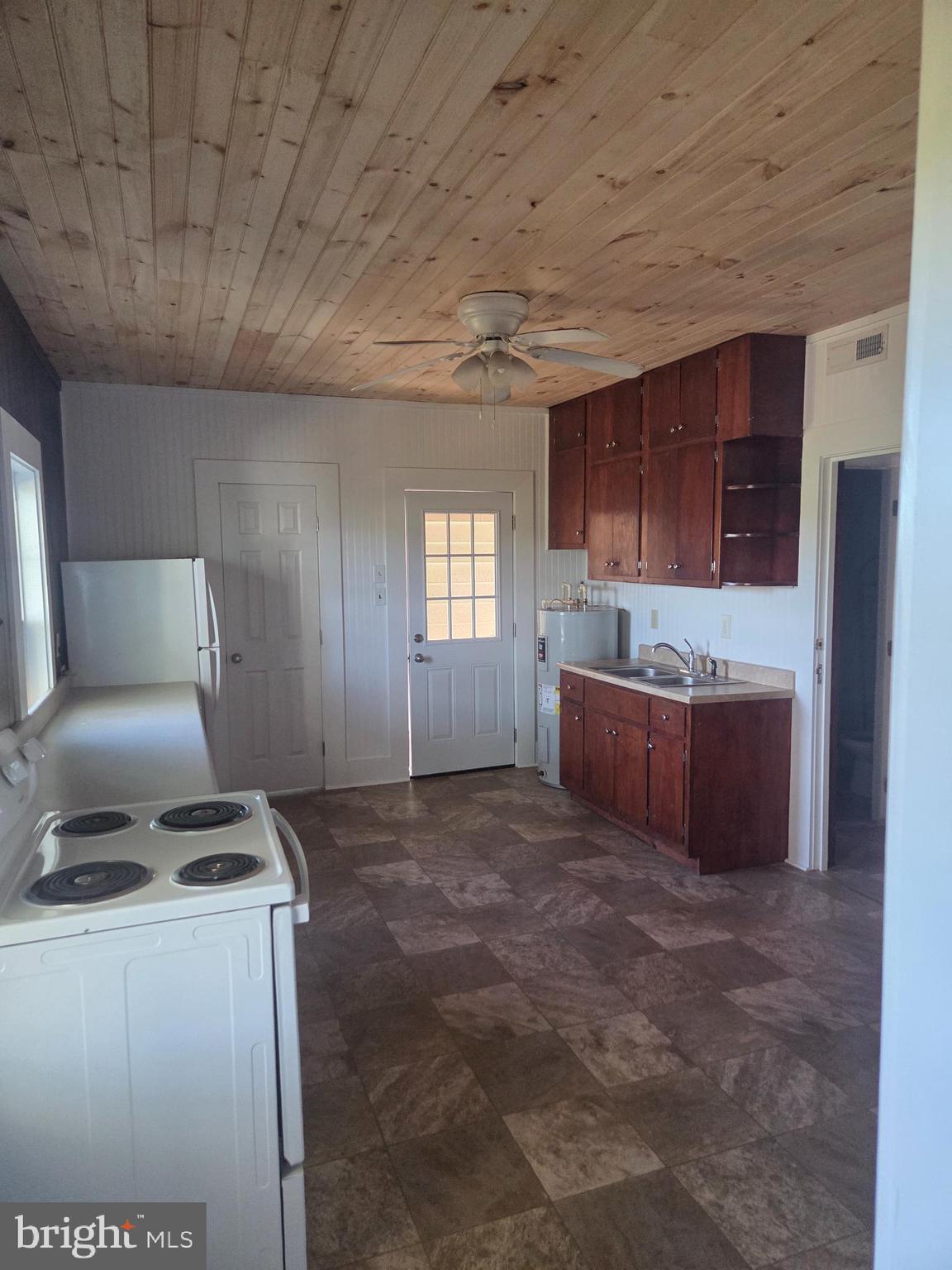 24790 Colton Point Road Clements, MD 20624 - Photo 4 of 16 a room with furniture and window