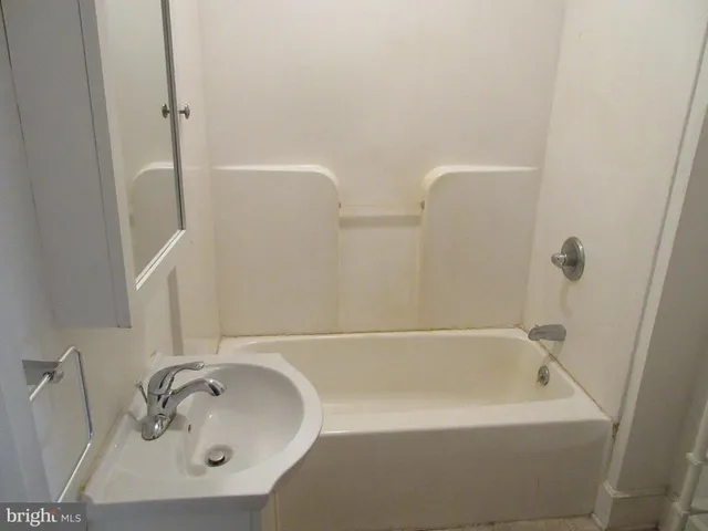 a bathroom with a tub