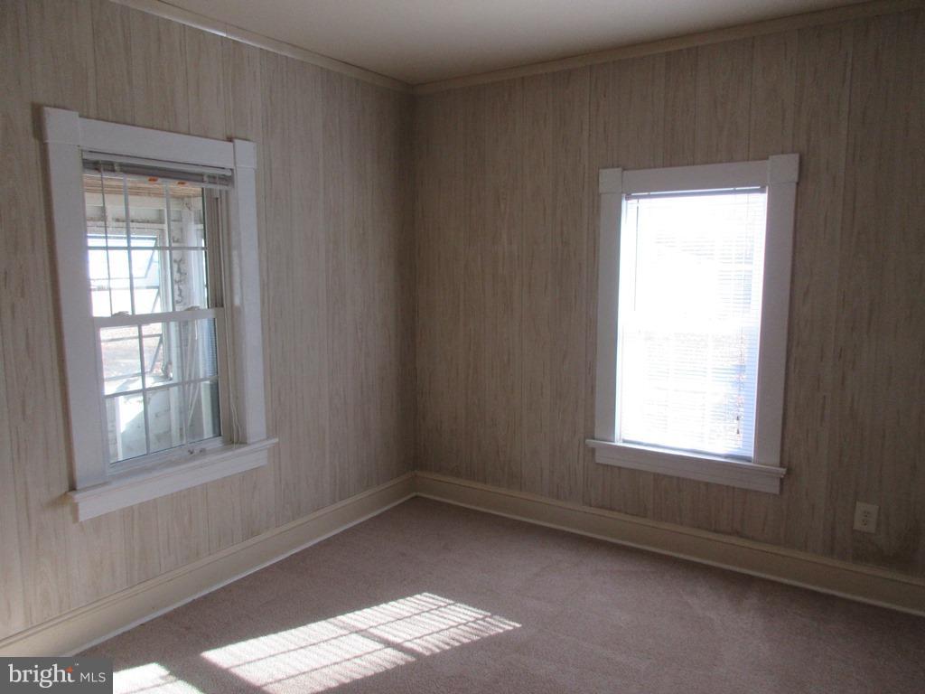 24790 Colton Point Road Clements, MD 20624 - Photo 10 of 16 an empty room with a window