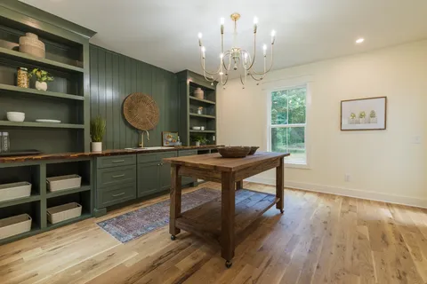 a view of two mirror and a sink